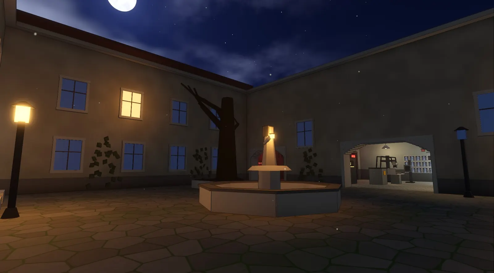 O pátio do sanatório à noite, com a fonte, postes acesos e janelas iluminadas